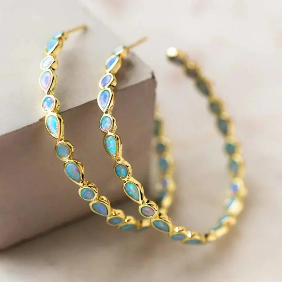 Boucles d'oreilles femme opale bleue – opale bleue et finition dorée